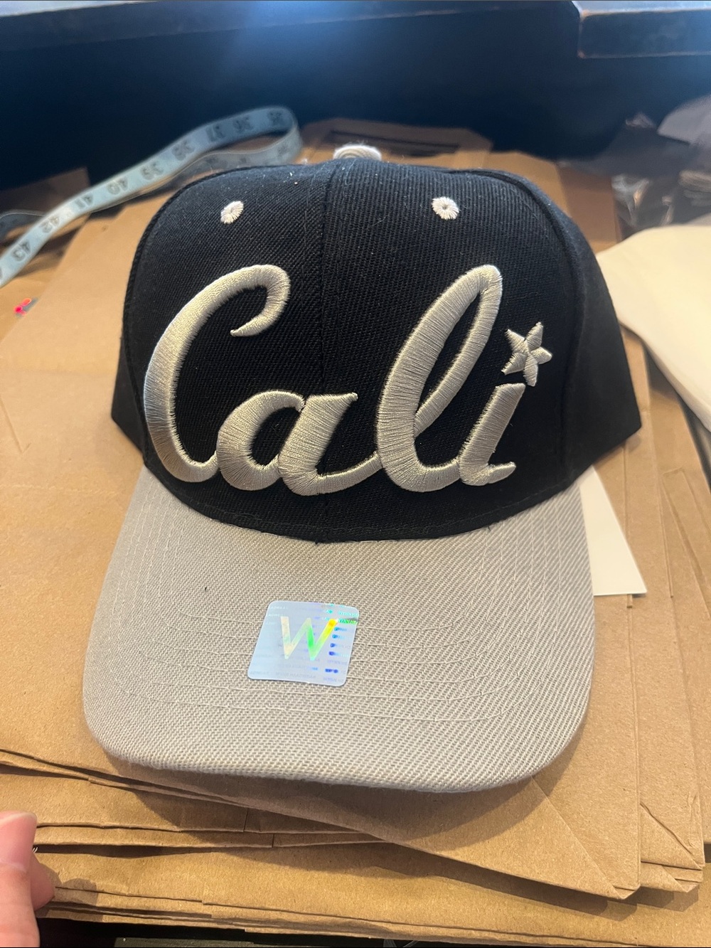 Cali Script Snapback Hat in Black and Gray